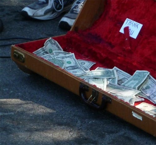 dollar donation to street musician