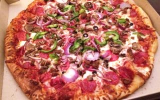 does costco deliver pizza