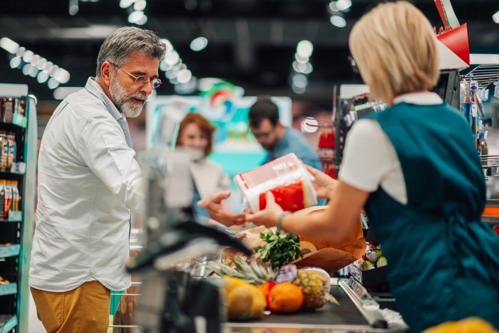 senior utilizing SNAP benefits