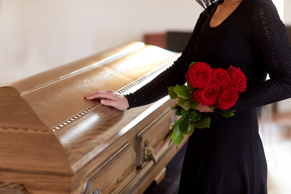 widow going into debt to afford a funeral