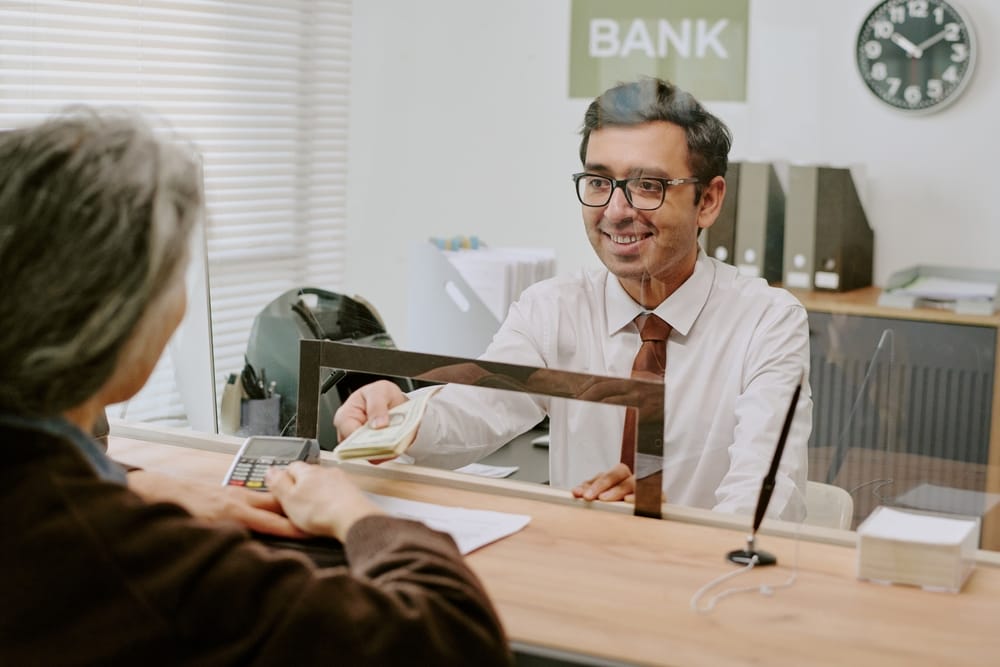 banks requiring seniors to confirm identity